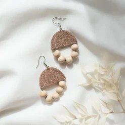Maanantaimalli Huvitella korvakorut, Shampanja/glitter