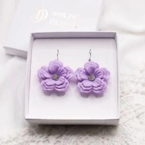 Smiling Design Daniela korvakorut